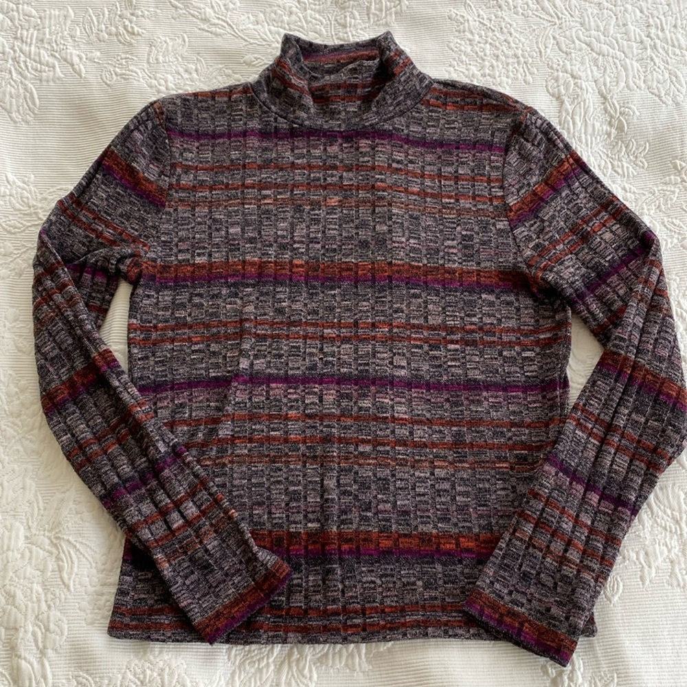 Lily White small mock neck small striped orange, brown striped fitted sweater.
